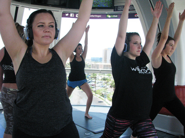 Paricipants take a Silent Savasana class on the High Roller at the Linq June 22. F. Andrew Taylor/View