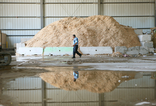 Manuel Madrigal, co-owner of Lunas Recycling, walks through the materials recovering facility at Lunas Recycling Monday, July 18, 2016, in Las Vegas. The family-owned waste management facility is  ...