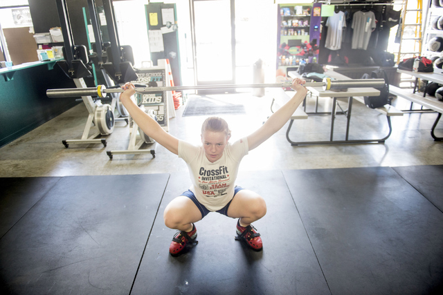 Marya Drabicki, 14, trains at CrossFit Henderson July 9. Drabicki recently won silver at the National Youth Championship for weightlifting. Jacob Kepler/View