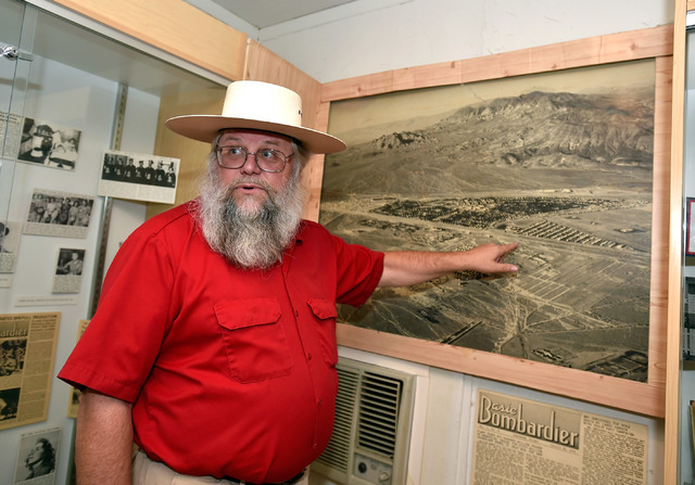 Clark County museums administrator Mark Hall-Patton points out a early an aerial photograph of Henderson during a tour at the Clark County Museum Tuesday, July 26, 2016, in Henderson. David Becker ...
