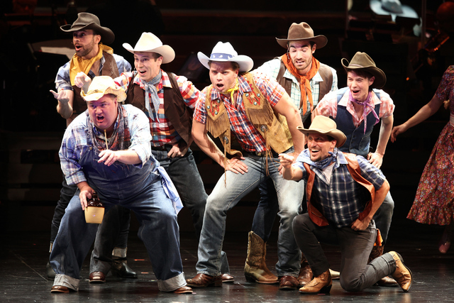 Whip Masters (Nathaniel Hackmann), center, joins fellow performers for the opening number, "Heck It's A Helluva Day" during the new musical "Idaho!" at The Smith Center. Loren Townsley/Las Vegas R ...