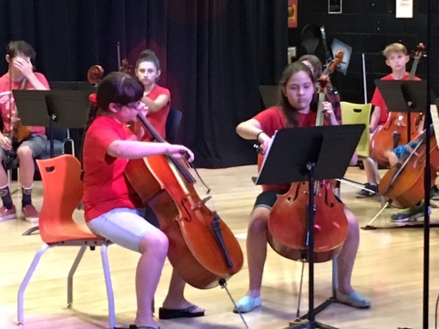Two students perform at a summer recital at Henderson International School. The school is partnering with the Nevada School of the Arts to enhance music education. Special to View