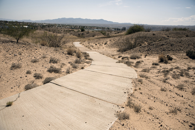 A cart trail on a closed golf course is seen Thursday, July 28, 2016, on the southern end of Laughlin, Nev. Jeff Scheid/Las Vegas Review-Journal Follow @jeffscheid