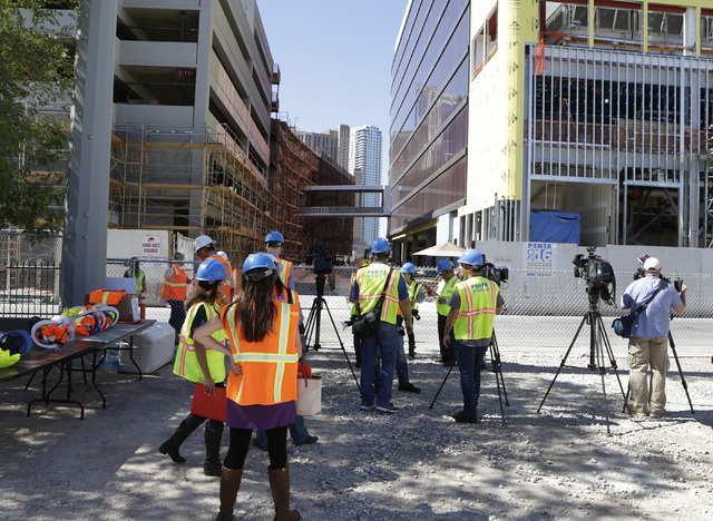 Members of the media wait outside the under-construction Lucky Dragon hotel-casino prior to the start of the hard hat tour at 300 W. Sahara Ave., on Thursday, July 7, 2016. Bizuayehu Tesfaye/Las V ...