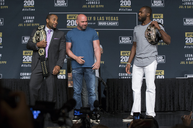 UFC president Dana White, center, watches Daniel Cormier, left, and Jon Jones pose during the UFC 200 press conference at MGM Grand hotel-casino on Tuesday, July 5, 2016, in Las Vegas. Erik Verduz ...