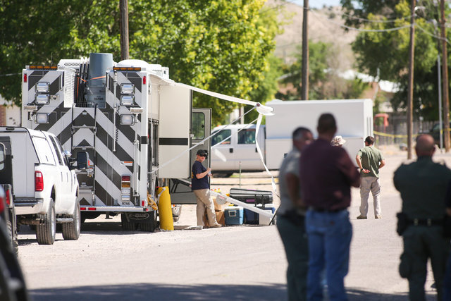 Police investigate shrapnel on Thursday, July 14, 2016, from a Wednesday night bombing that killed one person on Fifth Street in Panaca, Nevada. (Brett Le Blanc/Las Vegas Review-Journal) Follow @b ...