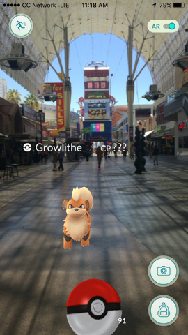 A Growlithe is seen at the Fremont Street Experience on the screen of a Pokemon Go user in downtown Las Vegas, on Wednesday, July 13, 2016. (Kristen DeSilva/Las Vegas Review-Journal Follow @kriste ...