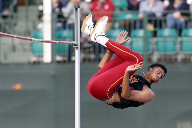 USC's Randall Cunningham clears the bar en route to winning the men's high jump at the NCAA outdoor track and field championships in Eugene, Ore., Friday, June 10, 2016. (AP Photo/Ryan Kang)