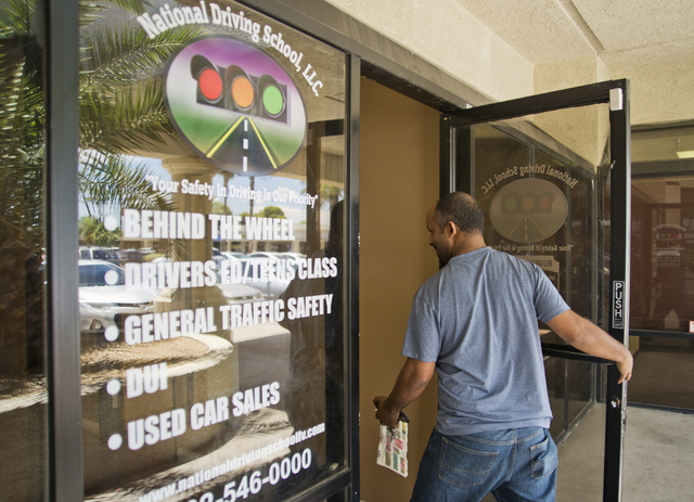 Woldu Tereda walks into his business, National Driving School, LLC, in Las Vegas on Wednesday, June 29, 2016. (Daniel Clark/Las Vegas Review-Journal Follow @DanJClarkPhoto)
