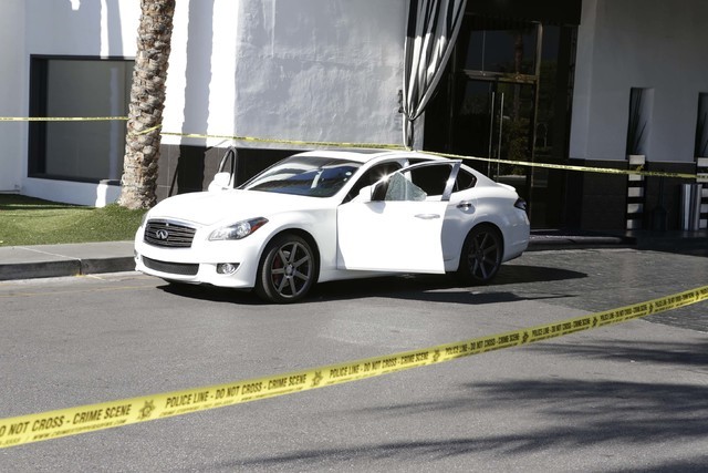A man was shot and wounded as he sat in his car at the Rumor Boutique Hotel, 455 E. Harmon Ave., Tuesday morning, July 19, 2016. (Bizuayehu Tesfaye/Las Vegas Review-Journal Follow @bizutesfaye)