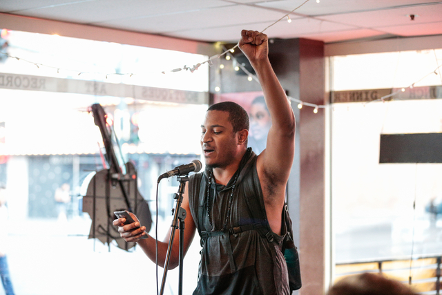 Nevada's Battle Born poetry slam team alternate member Marquis Ealy performs during the slam event at The Beat in downtown Las Vegas Friday, July 8, 2016. (Donavon Lockett/Las Vegas Review-Journal)