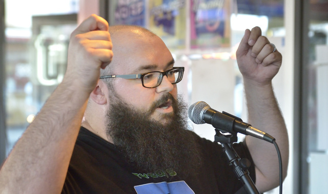 Organizer A.J. Moyer makes an announcement during a poetry slam sponsored by the Battle Born slam poetry team at The Beat Coffeehouse and Records at 520 Fremont St. in Las Vegas on Friday, July 22 ...