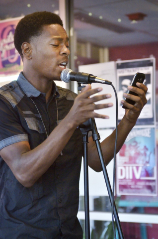 Dion Green does a reading during a poetry slam sponsored by the Battle Born slam poetry team at The Beat Coffeehouse and Records at 520 Fremont St. in Las Vegas on Friday, July 22, 2016. Bill Hugh ...