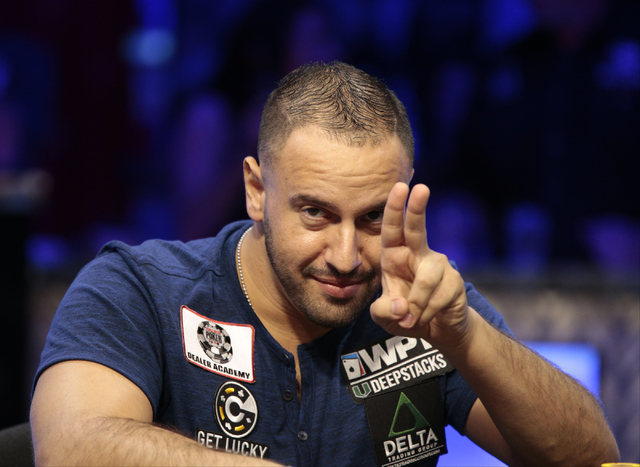 Michael Mizrachi gestures to his fans after winning a hand in the $50,000 buy-in Poker Players' Championship at the Rio Convention Center in Las Vegas on Wednesday, July 6, 2016. (Donavon Lockett/ ...
