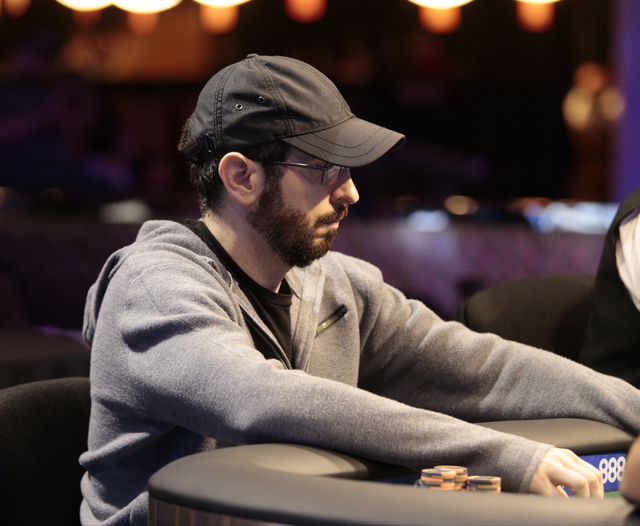 Poker player Brian Rast looks across the table while considering a bet during the $50,000 buy-in Poker Players' Championship at the Rio Convention Center in Las Vegas on Wednesday, July 6, 2016. ( ...