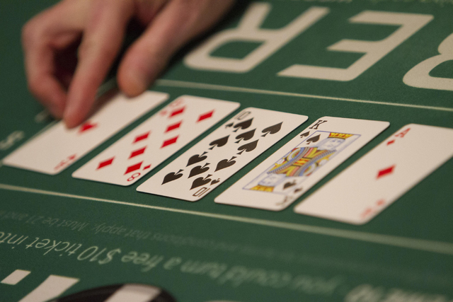 Cards are seen on a poker table during Day 4 of the Main Event of the World Series of Poker at the Rio Convention Center in Las Vegas on Friday, July 15, 2016. Richard Brian/Las Vegas Review-Journ ...