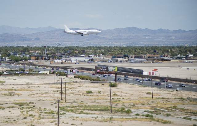 An aircraft is seen coming in for a landing from near the proposed site of a stadium near Tropicana Avenue and Koval Lane on Friday, July 1, 2016. Southwest has sent a letter to local officials re ...
