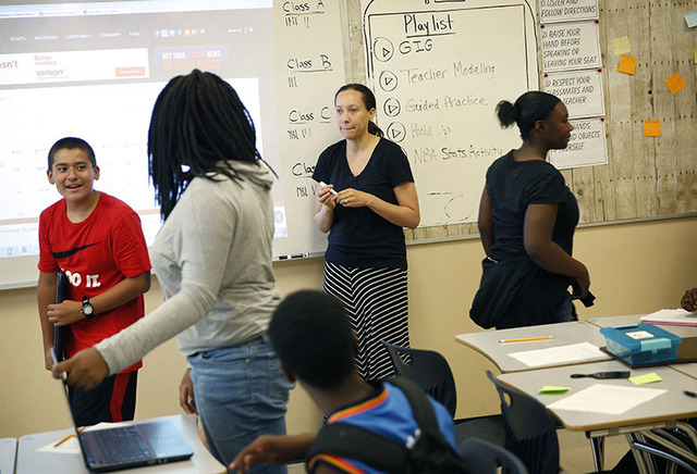 Crystal Nunes, second from right, works with students at Rebel Academy in North Las Vegas on June 29. Rebel Academy, spearheaded by UNLV's College of Education, is a project to give prospective te ...