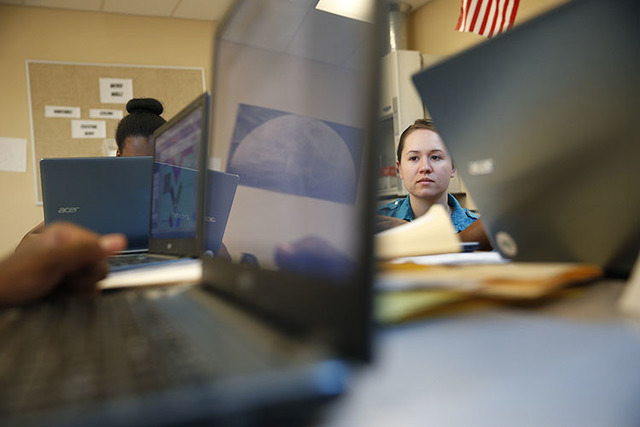 Christine Steiner works with students at Rebel Academy in North Las Vegas on June 29 Rebel Academy, spearheaded by UNLV's College of Education, is a project to give prospective teachers hands-on e ...