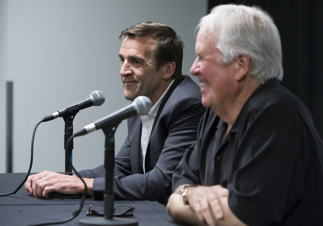 George McPhee, left, the new general manager of Las Vegas’ NHL expansion team, answers questions at a press conference at T-Mobile Arena on Wednesday, July 13, 2016, in Las Vegas. (Benjamin Hage ...