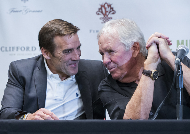 New general manager George McPhee, left, and Bill Foley, owner of Las Vegas’ NHL expansion team, talk on stage during a press conference at T-Mobile Arena on Wednesday, July 13, 2016, in Las Veg ...