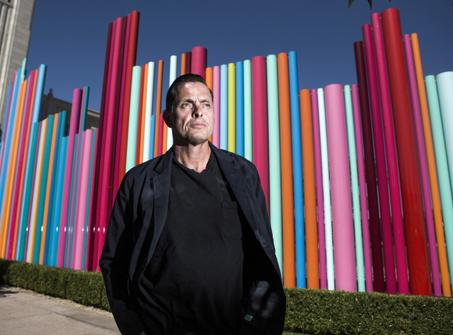 Artist Tim Bavington stands in front of the Pipe Dream art piece he created in Symphony Park at The Smith Center for the Performing Arts on Tuesday, July 12, 2016. Jeff Scheid/Las Vegas Review-Jou ...