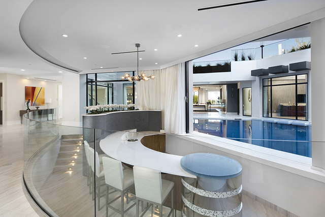 The 5-feet deep pool has a swim-up bar for entertaining. (Courtesy of Shapiro & Sher Group)