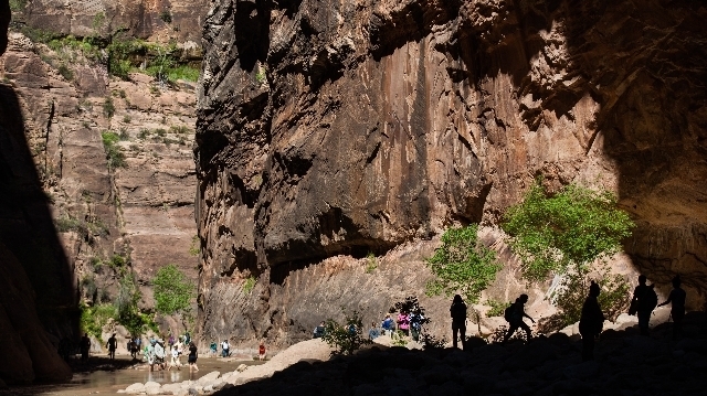 People walk along the Virgin River while hiking the Narrows at Zion National Park in Utah on Monday, Sept. 7, 2015. Chase Stevens/Las Vegas Review-Journal Follow @csstevensphoto