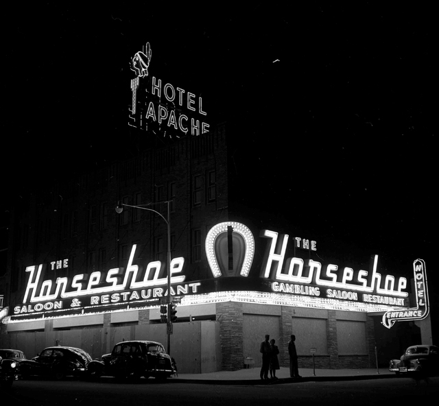In this Las Vegas News Bureau file photo the Hotel Apache marquee is seen above the Horseshoe hotel-casino in downtown Las Vegas on Jan. 1, 1951. Photo/Las Vegas News Bureau