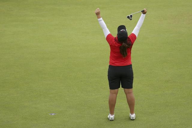 Inbee Park of South Korea reacts on the 18th green as she wins the gold medal in final round women's Olympic golf competition. (Andrew Boyers/Reuters)