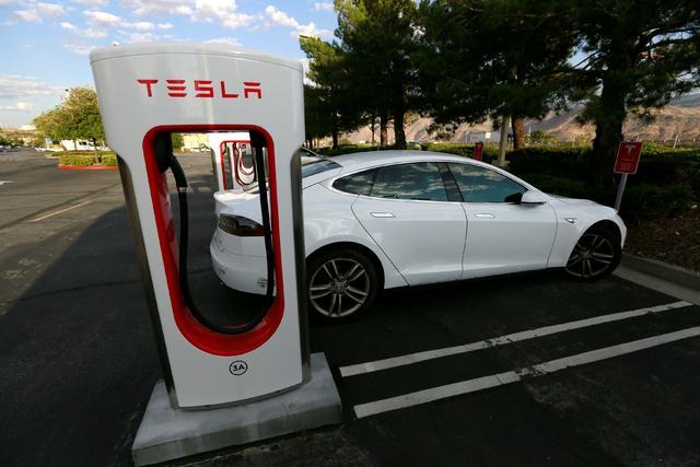A Tesla Model S charges at a Tesla Supercharger station in Cabazon, California, U.S. May 18, 2016.  (Sam Mircovich/Reuters)