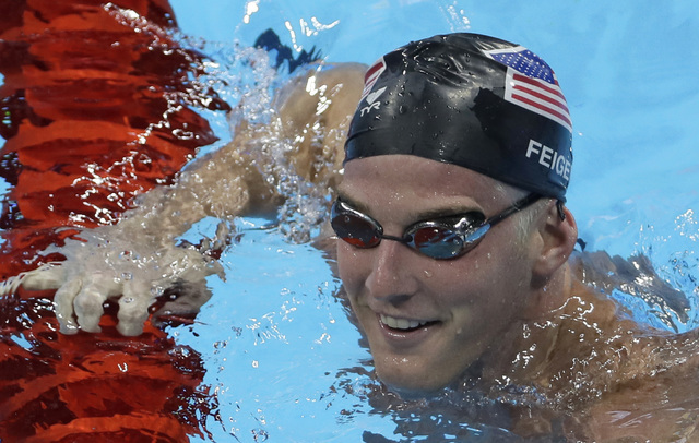 James Feigen smiles during a swimming training session prior to the 2016 Summer Olympics in Rio de Janeiro, Aug. 2, 2016. Feigen was one of four American Olympic swimmers in connection to a story  ...