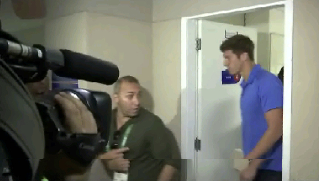 This still image taken from video shows U.S. swimmer James Feigen leaves a court meeting, early Friday, Aug. 19, 2016 in Rio de Janeiro, Brazil. (AP)