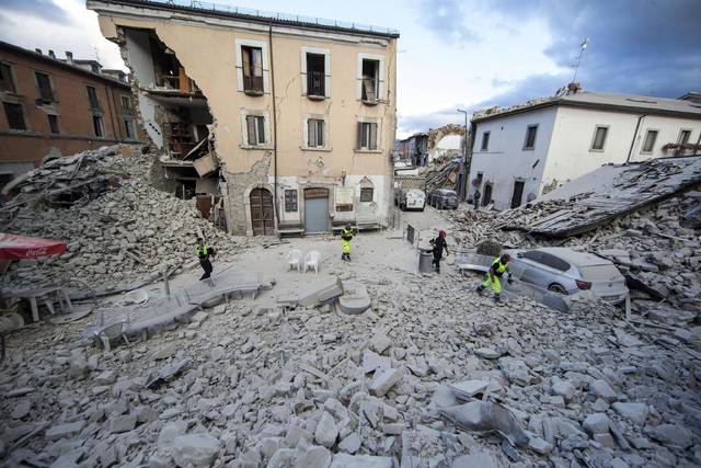 The side of a building is collapsed following an earthquake, in Amatrice Italy, Wednesday, Aug. 24, 2016.(Massimo Percossi/ANSA via AP)