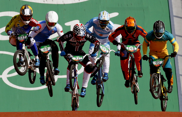 Cyclists, from right, Sam Willoughby of Australia, Twan van Gendt of the Netherlands, Gonzalo Molina of Argentina, Connor Fields of the United States, Tory Nyhaug of Canada, Jefferson Milano of Ve ...