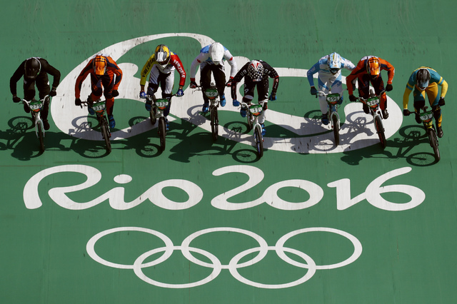 Cyclists, from right, Sam Willoughby of Australia, Twan van Gendt of the Netherlands, Gonzalo Molina of Argentina, Connor Fields of the United States, Tory Nyhaug of Canada, Jefferson Milano of Ve ...