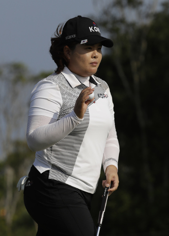 Inbee Park of South Korea walks away after putting on the 13th hole during the third round of the women's golf event at the 2016 Summer Olympics in Rio de Janeiro, Brazil, Friday, Aug. 19, 2016. ( ...