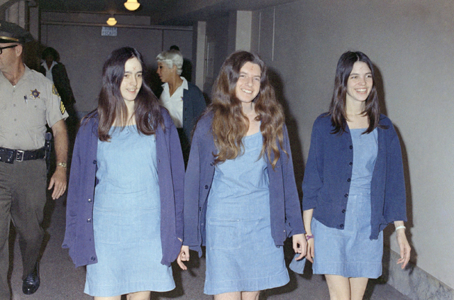 In this Aug. 20, 1970 file photo, Charles Manson followers, Susan Atkins, Patricia Krenwinkel and Leslie Van Houten, walk to court to appear for their roles in the 1969 cult killings of seven peop ...