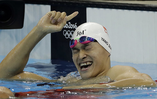 China's Sun Yang celebrates winning the final of the men's 200-meter freestyle during the swimming competitions at the 2016 Summer Olympics, Monday, Aug. 8, 2016, in Rio de Janeiro, Brazil. (AP Ph ...