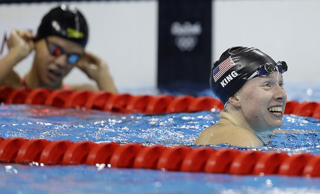 United States' Lilly King celebrates after winning the gold medal in the women's 100-meter breaststroke final during the swimming competitions at the 2016 Summer Olympics, Monday, Aug. 8, 2016, in ...