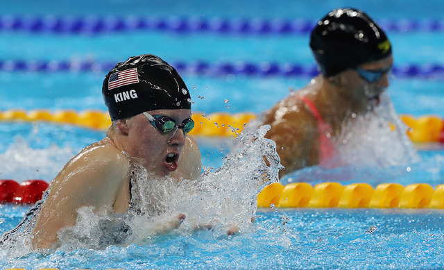United States' Lilly King, left, and Russia's Yulia Efimova compete in the final of the women's 100-meter breaststroke during the swimming competitions at the 2016 Summer Olympics in Rio de Janeir ...