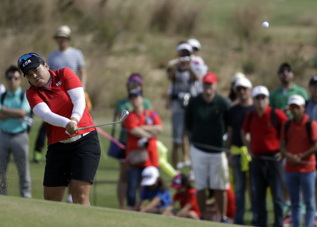 Inbee Park of South Korea hits on the 7th hole during the final round of the women's golf event at the 2016 Summer Olympics in Rio de Janeiro, Brazil, Saturday, Aug. 20, 2016. (Chris Carlson/The A ...
