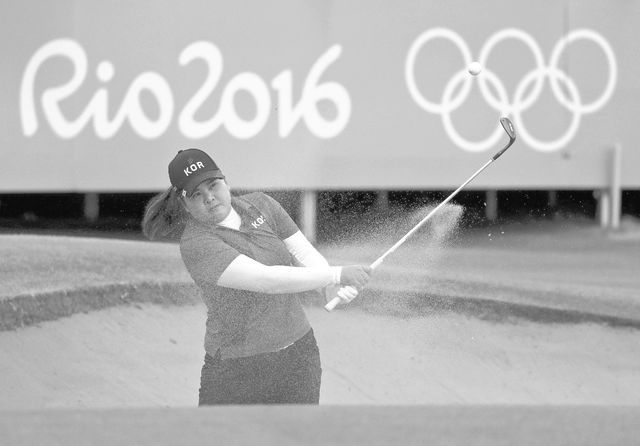 Inbee Park of South Korea, hits from the bunker on the 18th hole during the final round of the women's golf event at the 2016 Summer Olympics in Rio de Janeiro, Brazil, Saturday, Aug. 20, 2016. Pa ...