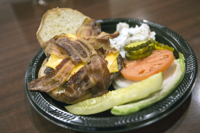 The Mel burger named after deli chef Mel Jones, who has worked for 35 years at Binion's Gambling Hall & Hotel, 128 Fremont St., is seen on Friday, Aug. 12, 2016. The downtown casino is celebra ...