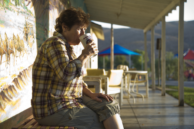 Cindy Phillips, a lon- time resident of Blue Diamond, drinks her morning coffee in front of the Village Market and Mercantile in the town of Blue Diamond on Wednesday, Aug. 10, 2016. (Daniel Clark ...
