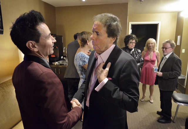 Performer Travis Cloer, left, and Dennis Bono chat backstage before the start of "The Dennis Bono Show” at the South Point hotel-casino on Thursday, July 21, 2016. (Bill Hughes/Las Vegas Review- ...