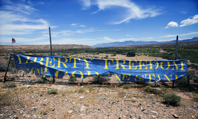 A sign secured on a fence on Nevada state Route 170 near Bunkerville is seen on Thursday, May 19, 2016. (Jeff Scheid/Las Vegas Review-Journal) Follow @jlscheid