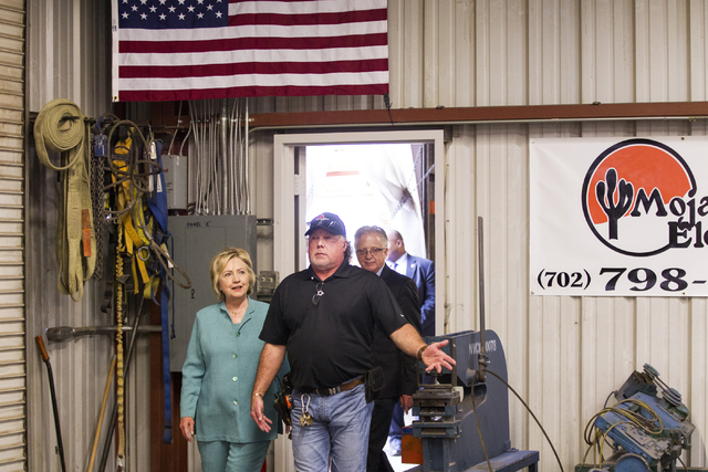 Democratic presidential nominee Hillary Clinton tours Mojave Electric with Mojave Electric supervisor Jackson Renner at Mojave Electric on Thursday, Aug. 4, 2016, in Las Vegas. Erik Verduzco/Las V ...