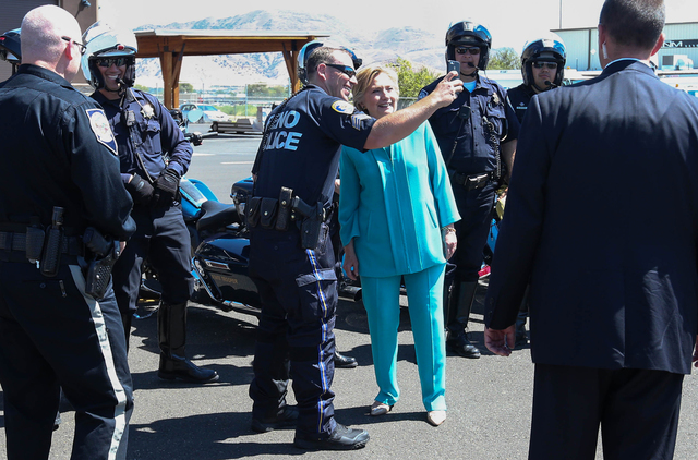 Democratic presidential candidate Hillary Clinton thanks local law enforcement officers following a campaign stop in Reno, Nev., Thursday, Aug. 25, 2016. Cathleen Allison/Las Vegas Review-Journal