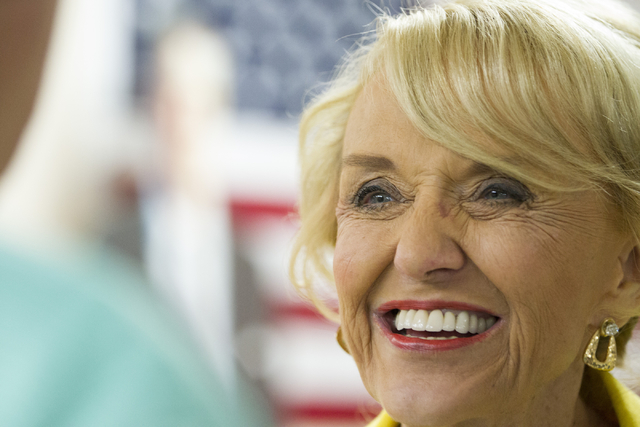 Former Arizona Gov. Jan Brewer attends the grand opening for the new campaign office for Republican presidential candidate Donald Trump in Las Vegas on Saturday, Aug. 27, 2016, in Las Vegas. (Erik ...